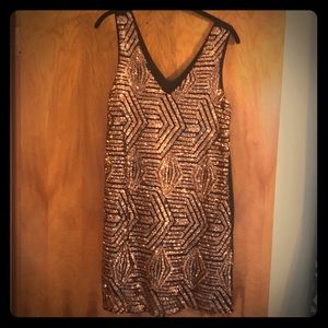 Everly.  Worn once to a party.  Like new.